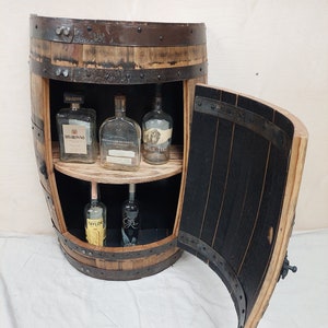 Half barrel cabinet with door,  whiskey cabinet