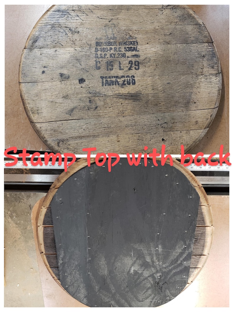 May include: A wooden barrel top with a black stamp that reads "BOURBON WHISKEY B-160-P R.C. 536AL GSP. KY 230 C 15 L-29 TARR 206". The top is marked "Stamp Top with Back".
