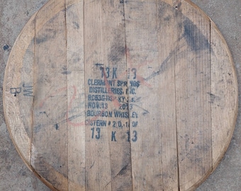Cleaned barrel heads, unfinished whiskey tops