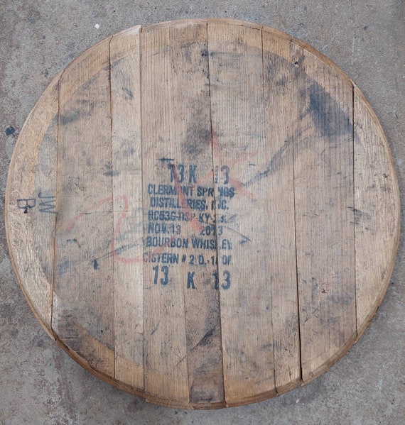 Cleaned barrel heads, unfinished whiskey tops