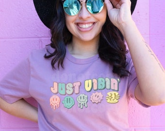 Womens tee shirt with smile face graphic just vibin