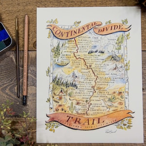 May include: A watercolor illustration of the Continental Divide Trail, a 3,100-mile hiking trail in the United States. The map shows the trail's route through various national parks and forests, including Yellowstone National Park, Glacier National Park, and the Grand Canyon. The map is surrounded by a decorative border with a banner that reads "Continental Divide Trail Established 1978, 3,100 Miles".
