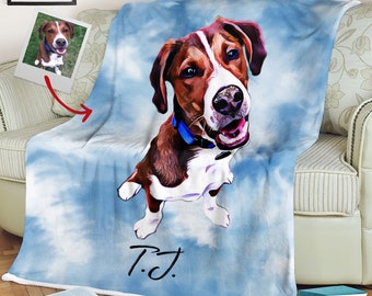 Könnte beinhalten: Eine blaue und weiße Fleece-Decke mit einer Cartoon-Illustration eines braunen und weißen Hundes mit einem blauen Halsband. Der Hund schaut nach oben und lächelt. Die Decke ist mit dem Namen "T.J." in schwarzer Kursivschrift personalisiert.
