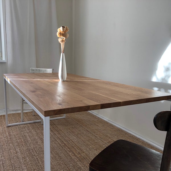 Modern table with metal legs and a wooden top. Contemporary minimalist dining table BASIC TRE II. Solid oak wood and white steel frame