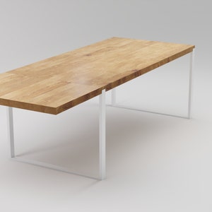 May include: A rectangular wooden table with a white metal frame. The table top is made of light wood with a natural grain pattern. The table is on a white background.