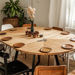 Round extendable table of solid wood FJÄRIL BLACK. Herringbone pattern. Oak table for kitchen & dining room. Scandinavian, Art Deco, Boho