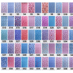 May include: A collection of 60 different patterned paper sheets, each measuring 10 cm by 10 cm. The patterns are colorful and varied, featuring flowers, stripes, polka dots, and other designs.