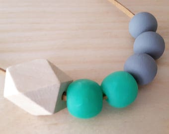 Green geometric wood and clay beaded necklace