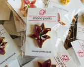 Lily pin badge