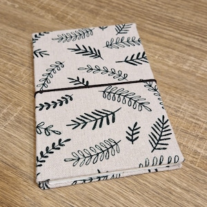 Leporello con tapa dura como un libro de lienzo.