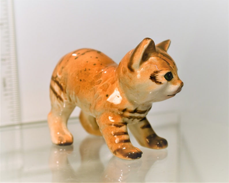 orange tabby cat statue