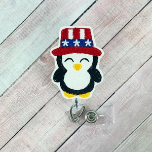 Porta credencial de pingüino del 4 de julio, porta credencial de verano, clip retráctil para credencial de identificación, adorno intercambiable para credencial, compañero seguro para credencial de resonancia magnética