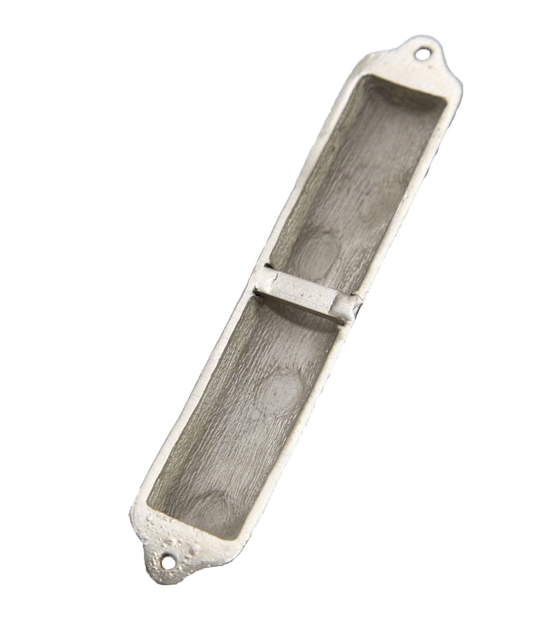 May include: Silver-toned metal Torah pointer case with a decorative design. The case is open and the pointer is not visible.