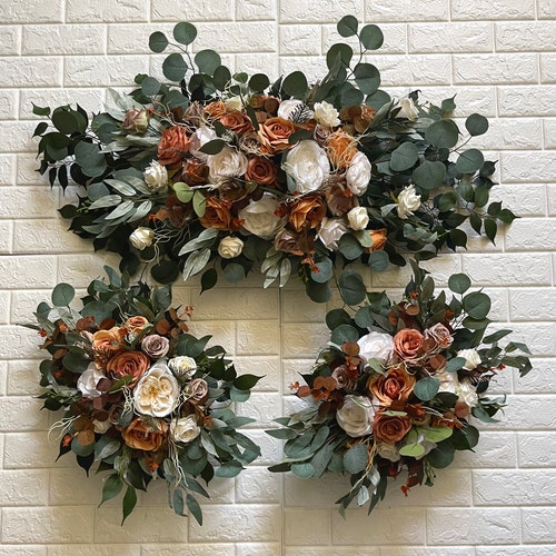 Orange Brown Terracotta Cinnamon Wedding Arch Arrangement Arbor Arrangements White Flowers Eucalyptus Wedding Faux Flowers Wedding Decor