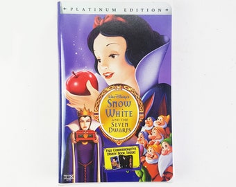 ウォルト・ディズニーの『白雪姫と七人のこびと』プラチナ