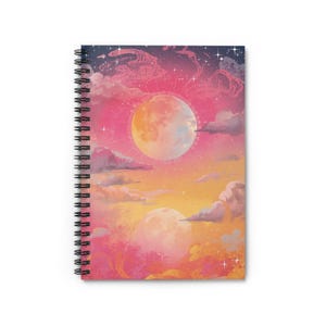 May include: Spiral-bound notebook with a colourful cover illustration of a night sky scene. The artwork shows a large, full moon set against pink, orange, and purple clouds, with stars in the sky. The notebook is ideal for writing and sketching, with a spiral binding.