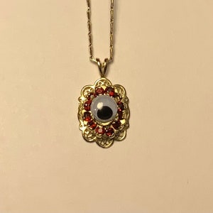 The Rudy Eye Necklace vintage necklace adorned with googly eye