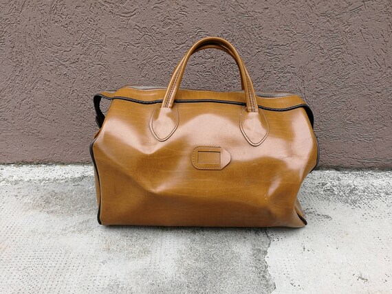 tan travel bag