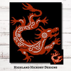 May include: A red and white dragon design on a black background. The dragon is detailed with white scrollwork and a circular design on its head. The image includes the text "HIGHLAND HICKORY DESIGNS" at the bottom.