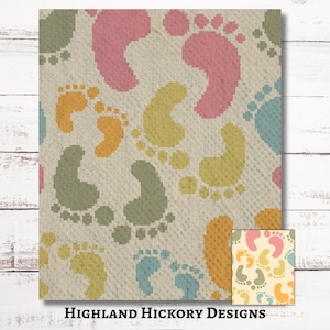 May include: A beige fabric with a repeating pattern of colorful baby footprints in shades of pink, yellow, green, orange, and blue. The words "Highland Hickory Designs" are printed at the bottom of the image.