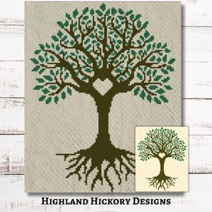 May include: A green tree with a heart-shaped opening in the trunk and brown roots. The tree is on a beige background with the text "HIGHLAND HICKORY DESIGNS" at the bottom.