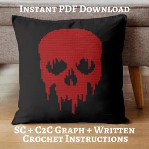 May include: Black square cushion featuring a red pixelated skull design. The skull has a dripping effect. The text "INSTANT PDF DOWNLOAD" is at the top, and "SC + C2C GRAPH + WRITTEN CROCHET INSTRUCTIONS" is at the bottom.