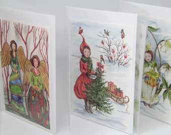 Christmas card set-3 cards enclosed with transparent paper-rosehip girl, Christ rose child and forest gel