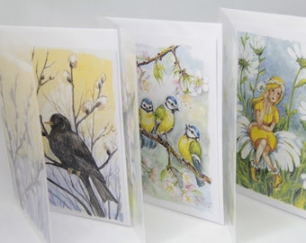 Kunstkartenset - 3 Karten mit Transparentpapier umschlossen - Amsel in Weidenkätzchen, Meisen im Apfelbaum, Gänseblümchenmädchen