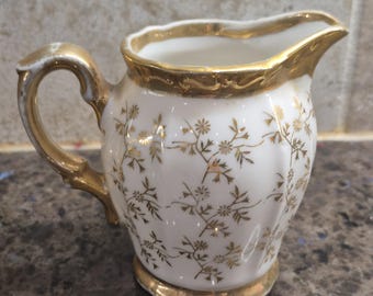 Jarra para crema Crown Pottery vintage, blanca y dorada, de 8,25 cm (4 oz), para juego de té. Excelente estado.