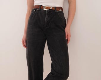 Pantalones vaqueros vintage de cinco bolsillos de algodón denim color carbón.