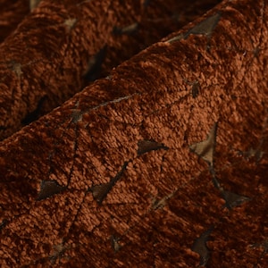 May include: A set of three ceramic mugs with a speckled, matte finish. The mugs are in shades of cream, light gray, and dark gray. Each mug has a simple, minimalist design, perfect for coffee or tea.