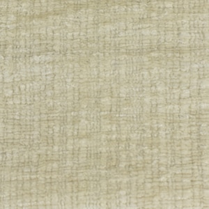 May include: A close-up of a beige textured fabric with a woven pattern.