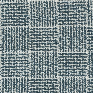 May include: A close-up of a blue and white patterned fabric with a woven texture.