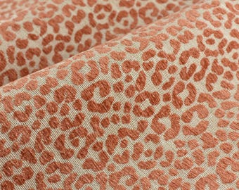 Designerska, gruba tkanina obiciowa z mieszanki lnu, kremowo-koralowa, szenilowa, żakardowa, z teksturą skóry zwierzęcej | Tkanina dekoracyjna tkana w geometryczne wzory