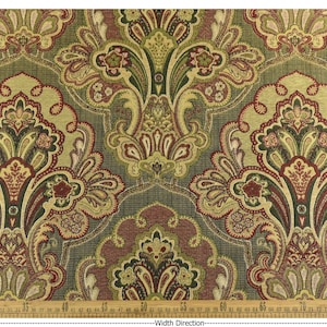 May include: Decorative fabric with a repeating floral pattern in shades of green, gold, and burgundy. The design features stylized flowers and leaves on a muted green background. The fabric is likely used for upholstery or home decor.