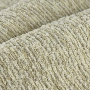 Schwerer, nussiger, texturierter, elfenbeinfarbener Boucle-Polsterstoff |