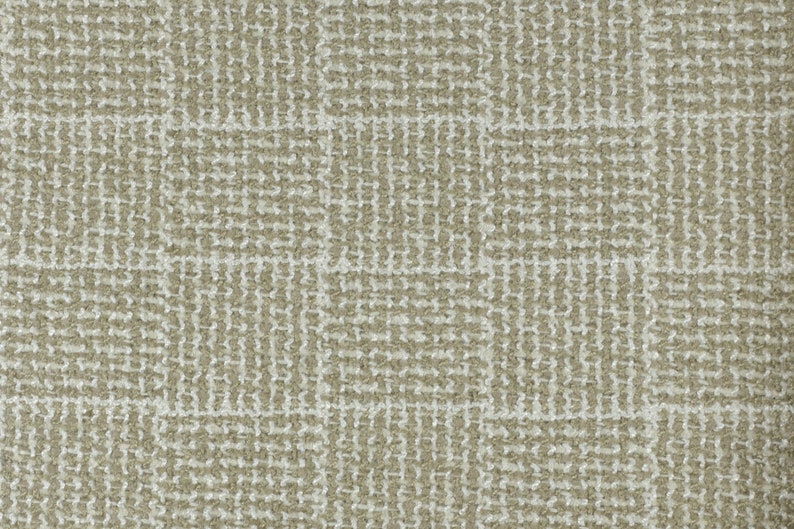 May include: A close-up of a beige woven fabric with a subtle geometric pattern. The fabric has a textured surface and a slightly rough feel.