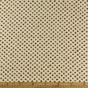 May include: White fabric with a repeating pattern of small, brown dots. The dots are arranged in a diagonal pattern.