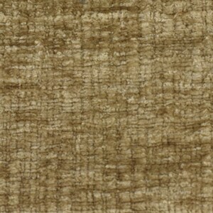 May include: A close-up of a textured fabric in a brown and beige colour scheme. The fabric has a woven appearance and a slightly rough texture.