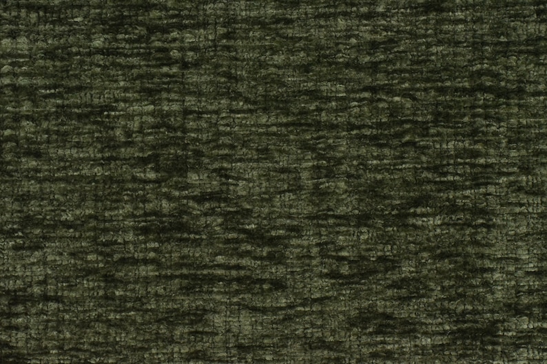 May include: Close-up of a dark green textured fabric with a subtle sheen. The fabric has a woven appearance with a slightly raised texture.