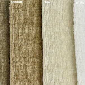May include: Four fabric swatches in different shades of brown and white. The swatches are labelled "Grey Olive", "Sandrift", "Tea", and "White".