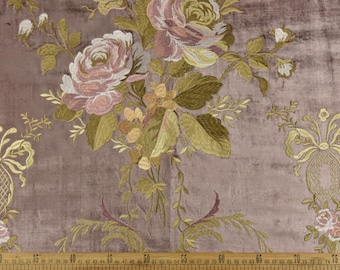 May include: Dusty rose fabric with embroidered floral design. The fabric features large roses in shades of pink and white, with green and gold leaves and stems. Decorative gold bows and floral accents are also present.