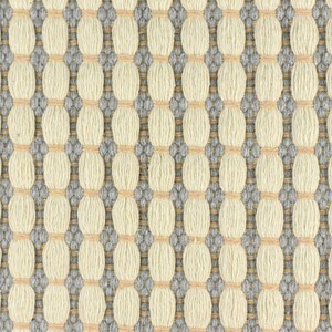 May include: A close-up of a woven fabric with a repeating pattern of small, light beige circles surrounded by a darker gray border. The fabric has a subtle texture and a slightly raised surface.
