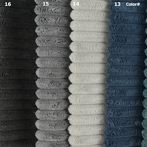 May include: Five fabric swatches in different colours: black, grey, white, blue, and teal. The fabric has a corduroy texture.