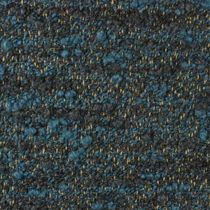 May include: Close-up of a textured fabric with a speckled pattern. The fabric features a mix of colors, including teal, dark gray, and gold. The texture appears to be woven, with small, raised areas creating a tactile surface.