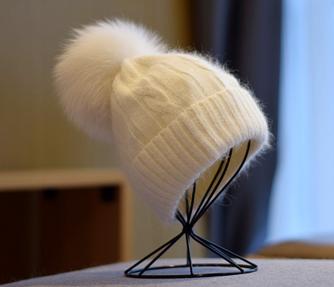 ladies hat with fur pom pom