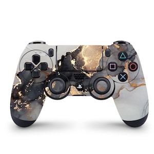 May include: A black and gold PlayStation 4 controller with a marble-like design.