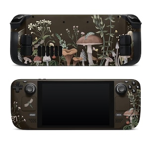 Könnte beinhalten: Eine dunkelbraune Spielekonsole mit einem Pilz- und Blumendesign. Die Konsole hat einen Bildschirm, Knöpfe und einen Joystick.