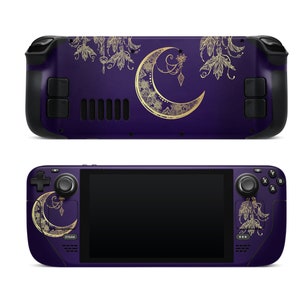 May include: A purple and gold handheld gaming console with a crescent moon design. The console has a screen, buttons, and a joystick.