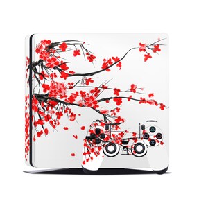 Puede incluir: Piel blanca para consola de juegos con un diseño de flor de cerezo negro y rojo. La piel está diseñada para adaptarse a una consola y un mando Playstation 4.